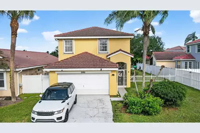 7745 Springfield Lake Drive, Lake Worth, FL 33467 - Photo 1