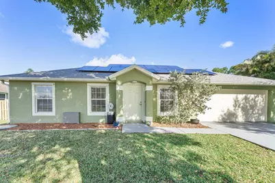 655 SE Ron Rico Terrace, Port Saint Lucie, FL 34983 - Photo 1