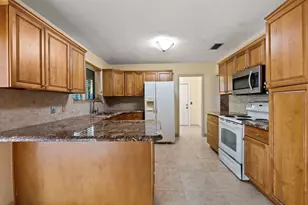 8 Bell Ln, Palm Springs, FL 33406 - Photo 13