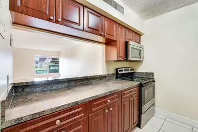 12003 Poinciana Boulevard, Unit #105, Royal Palm Beach, FL 33411 - Photo 15