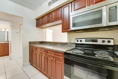 12003 Poinciana Boulevard, Unit #105, Royal Palm Beach, FL 33411 - Photo 17