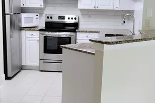 1000 Crestwood Ct S, Royal Palm Beach, FL 33411 - Photo 5