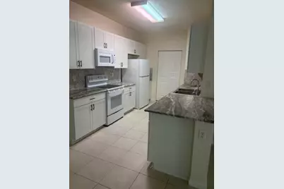 3557 Forest Hill Boulevard, Unit #49, Palm Springs, FL 33406 - Photo 1