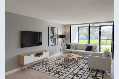 218 Lake Pointe Drive, Unit #108, Oakland Park, FL 33309 - Photo 1