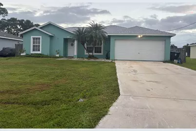 1049 SW Jacqueline Avenue, Port Saint Lucie, FL 34953 - Photo 1