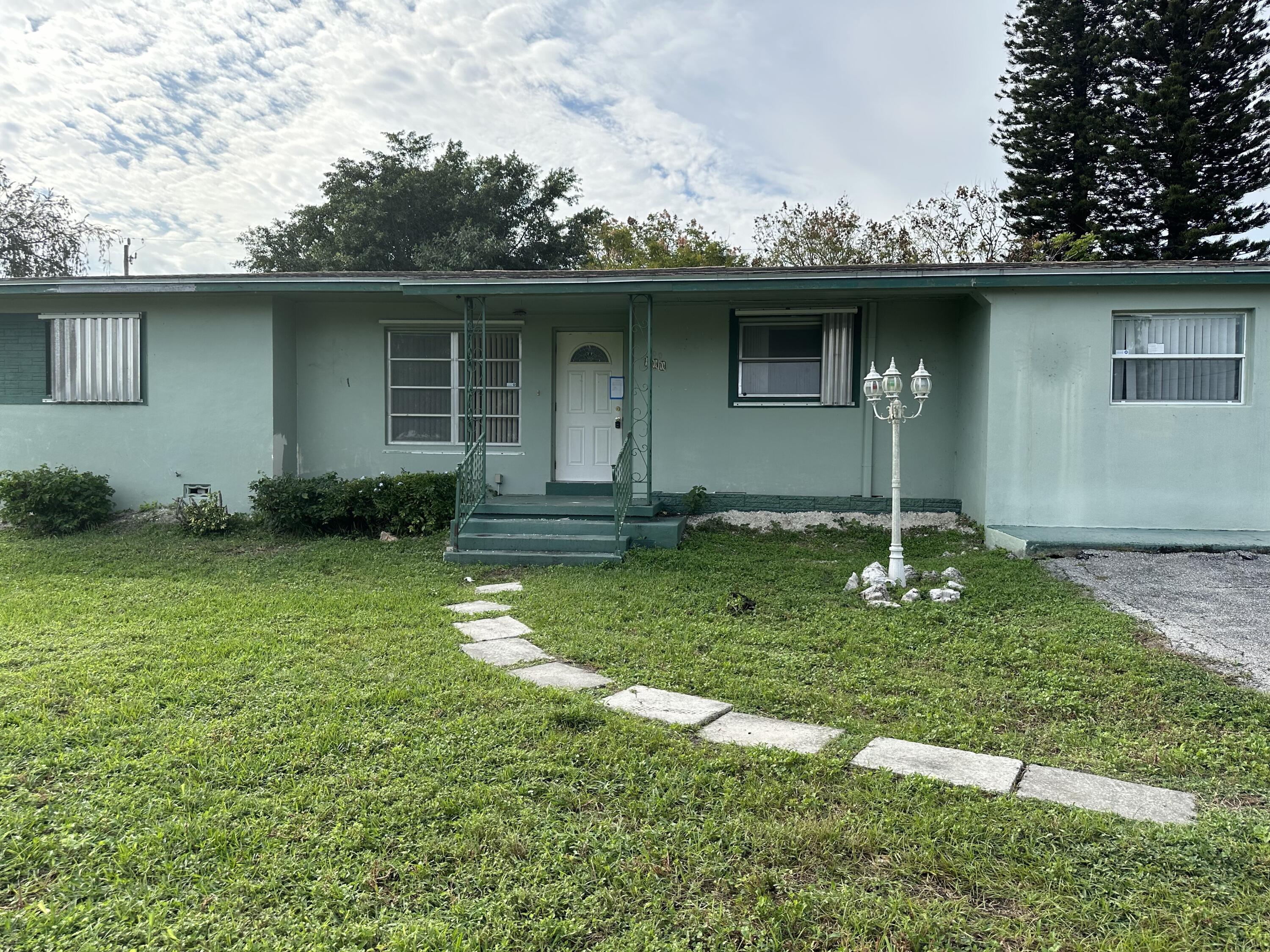 100 SE 5th St, Belle Glade, FL 33430 - MLS RX-10850406 - Coldwell Banker