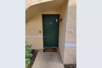 1749 Village Boulevard, Unit #107, West Palm Beach, FL 33409 - Photo 1