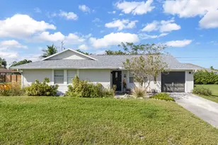 454 SE Cork Rd, Port Saint Lucie, FL 34984 - Photo 1