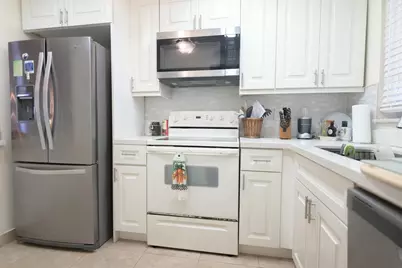 8051 Sunrise Lakes Drive, Unit #101, Sunrise, FL 33322 - Photo 1