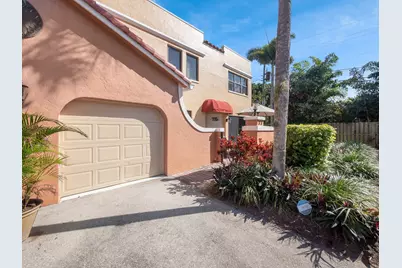77 Uno Lago Drive, Juno Beach, FL 33408 - Photo 1
