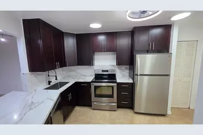 1690 NE 191 Street #409-1, North Miami Beach, FL 33179 - Photo 1