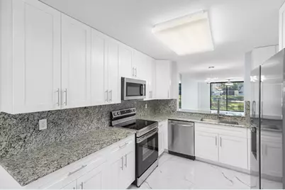 15244 Lakes Of Delray Boulevard, Unit #105, Delray Beach, FL 33484 - Photo 1