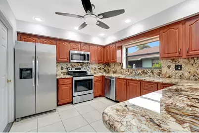9765 Pecan Tree Drive, Unit #B, Boynton Beach, FL 33436 - Photo 1