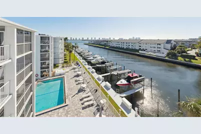 108 Paradise Harbour Boulevard, Unit #107, North Palm Beach, FL 33408 - Photo 1
