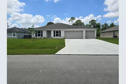 1074 SW Calmar Avenue, Port Saint Lucie, FL 34953 - Photo 1