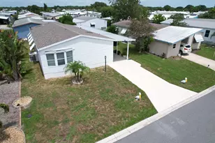 908 Bougainvillea Cir, Barefoot Bay, FL 32976 - Photo 1