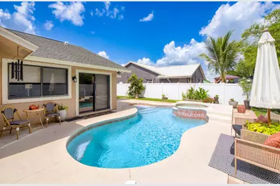801 NE Zebrina Senda, Jensen Beach, FL 34957 - Photo 1