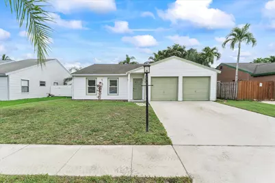 7839 Elwood Drive, Lake Worth, FL 33467 - Photo 1