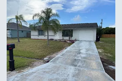 327 NE Surfside Avenue, Port Saint Lucie, FL 34983 - Photo 1