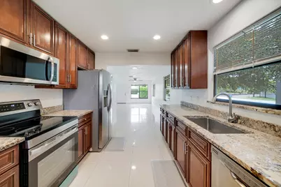 1981 Holman Drive, Unit #1, North Palm Beach, FL 33408 - Photo 1