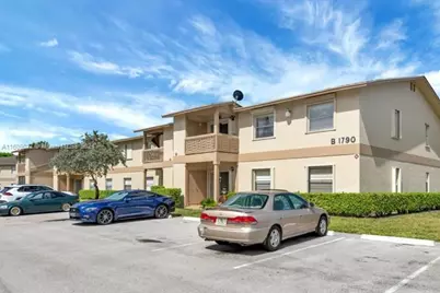 1790 Abbey Road, Unit #104, West Palm Beach, FL 33415 - Photo 1
