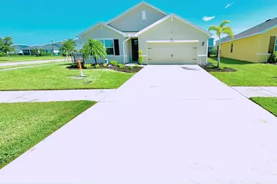 10947 SW Tessili Way, Port Saint Lucie, FL 34987 - Photo 1