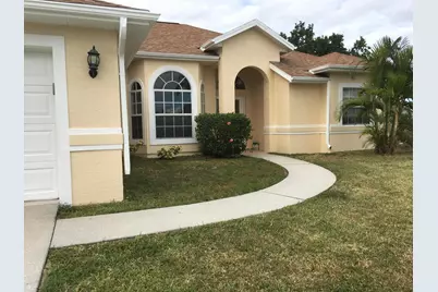 713 SW Ancona Road, Port Saint Lucie, FL 34953 - Photo 1