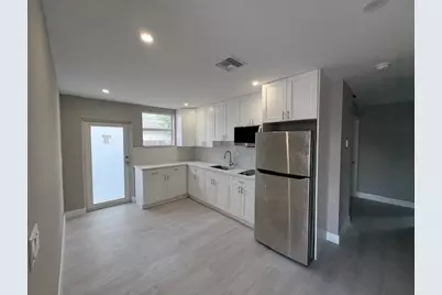 5580 Honeysuckle Drive, Unit #1st Floor, West Palm Beach, FL 33415 - Photo 1