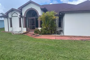 3128 SE Card Terrace N, Port Saint Lucie, FL 34984 - Photo 1