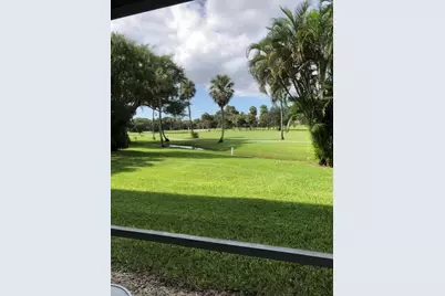 3980 Oaks Clubhouse Drive, Unit #101, Pompano Beach, FL 33069 - Photo 1