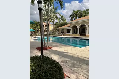 6529 Emerald Dunes Drive, Unit #305, West Palm Beach, FL 33411 - Photo 1