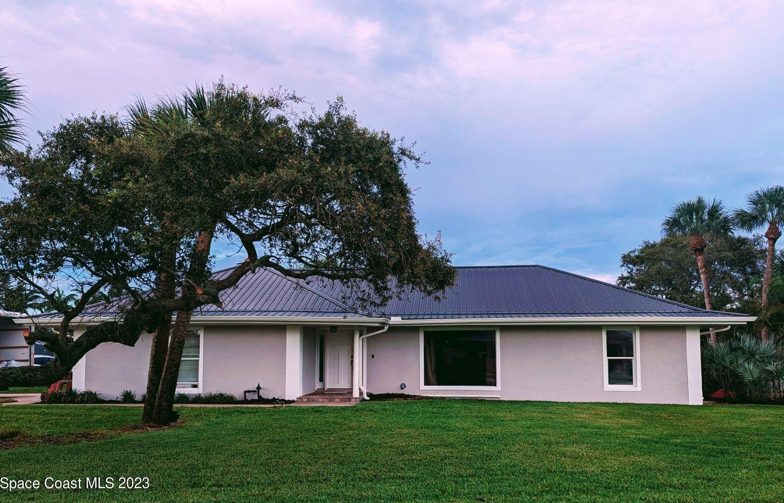 591 Spindle Palm Dr, Melbourne FL  32903-3855 exterior