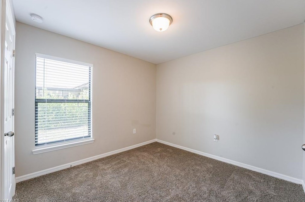 133 Shadow Lk Dr, Lehigh Acres FL 33974-0826 exterior