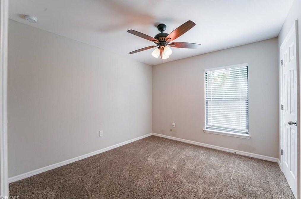 133 Shadow Lk Dr, Lehigh Acres FL 33974-0826 exterior