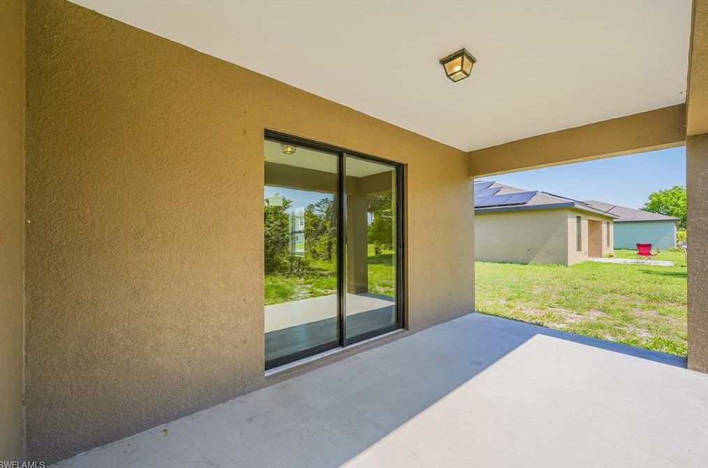 133 Shadow Lk Dr, Lehigh Acres FL 33974-0826 exterior