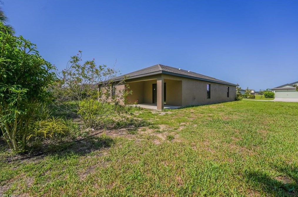 133 Shadow Lk Dr, Lehigh Acres FL 33974-0826 exterior