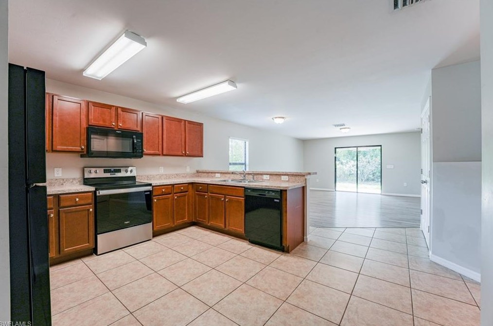 133 Shadow Lk Dr, Lehigh Acres FL 33974-0826 exterior