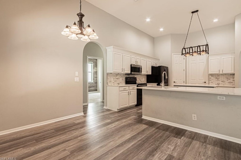 303 Burnt Pne Dr, Naples FL 34119-9773 exterior