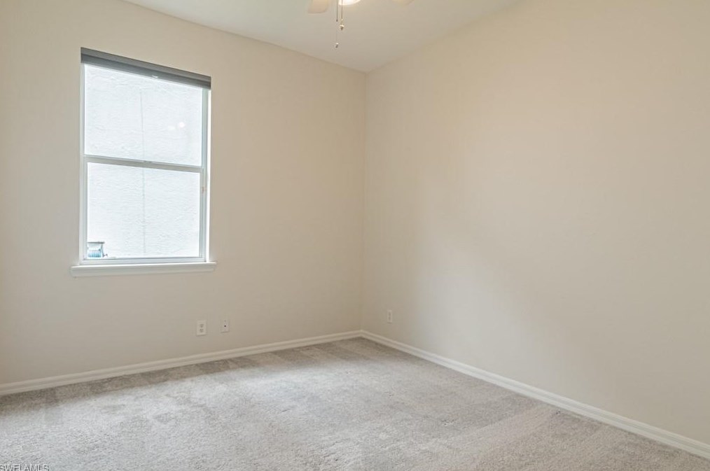 303 Burnt Pne Dr, Naples FL 34119-9773 exterior