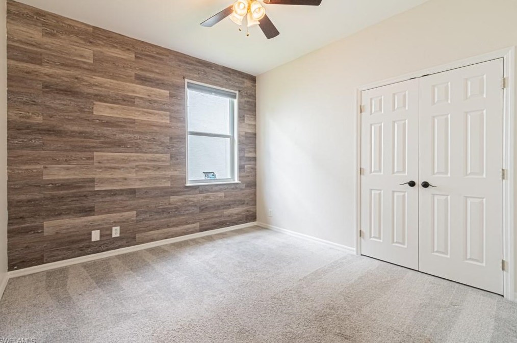 303 Burnt Pne Dr, Naples FL 34119-9773 exterior