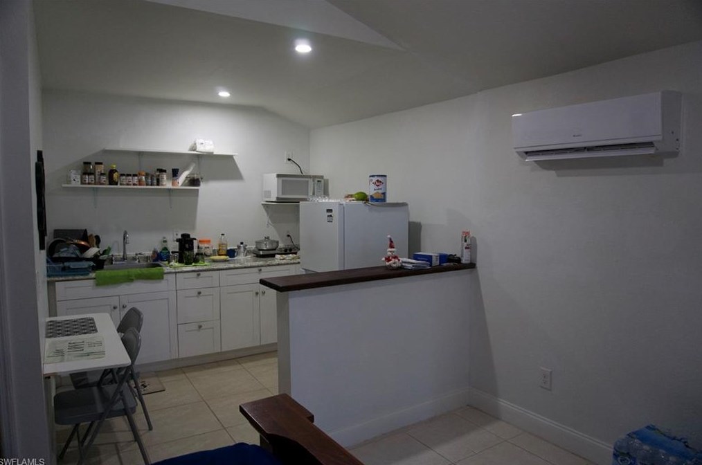 2407 Randall Blvd, Naples FL 34120-5577 exterior