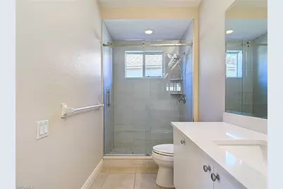 9190 Troon Lakes Dr, Naples, FL 34109 - Photo 25