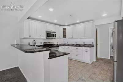 6145 Faxon Court, Colorado Springs, CO 80922 - Photo 13