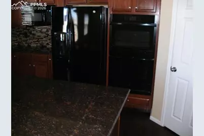 7750 Dutch Loop, Colorado Springs, CO 80925 - Photo 19