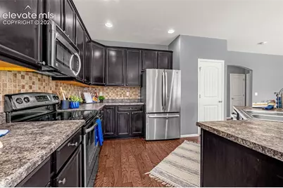 6133 Farmstead Place, Colorado Springs, CO 80925 - Photo 49
