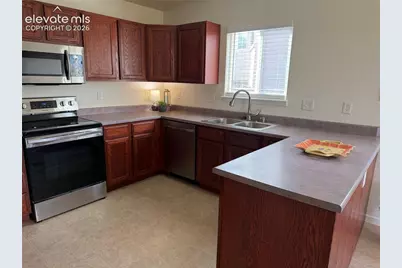 7143 Dove Valley Place, Colorado Springs, CO 80925 - Photo 5