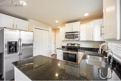 6185 Wood Bison Trail, Colorado Springs, CO 80925 - Photo 11