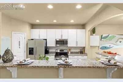 6569 Tranters Creek Way, Colorado Springs, CO 80925 - Photo 17