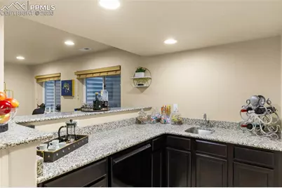 6569 Tranters Creek Way, Colorado Springs, CO 80925 - Photo 39