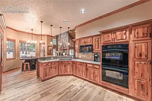1210 Kenosha Dr, Larkspur, CO 80118 - Photo 9